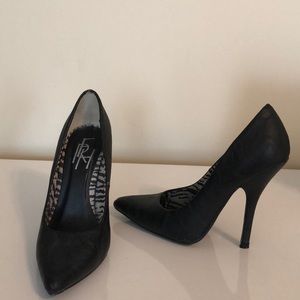 Black leather pumps